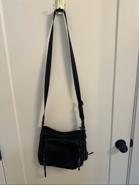 Tumi Black Crossbody Bag with Front Zip Pocket